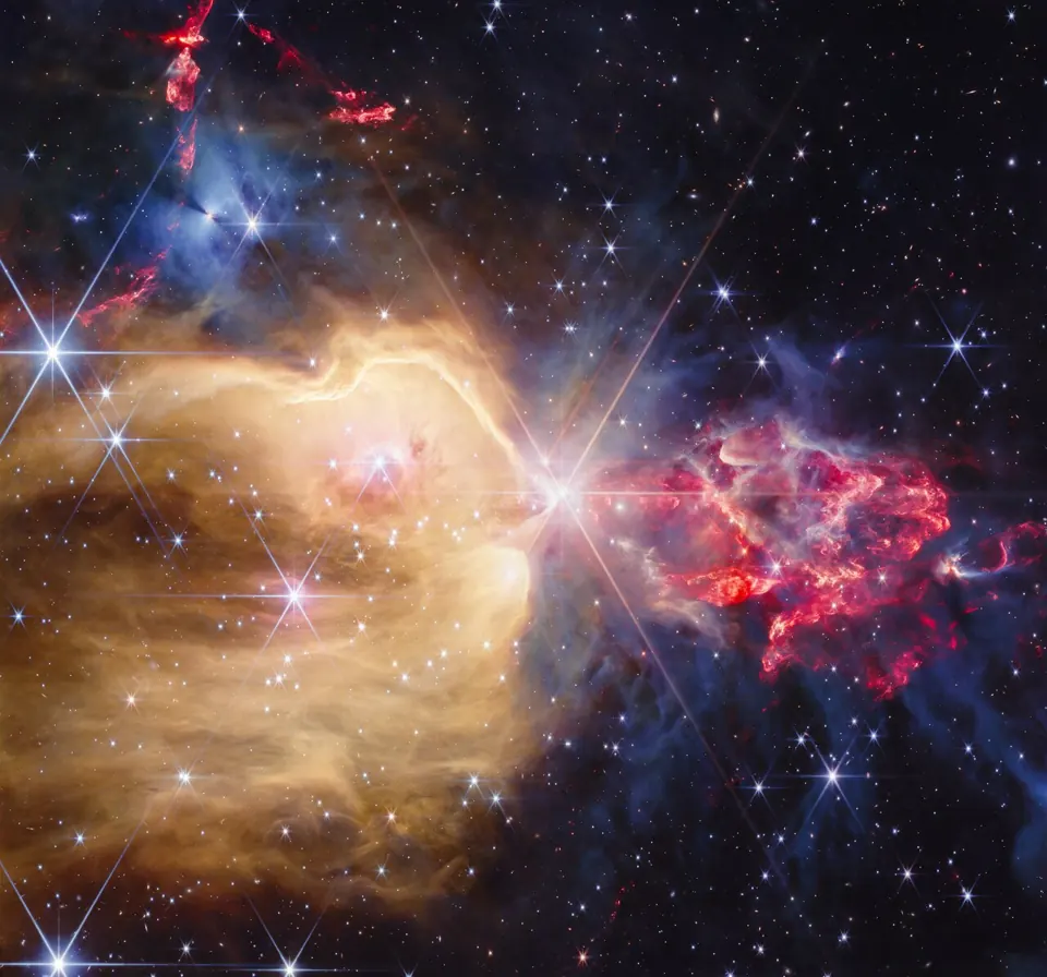 La nebulosa NGC 7129 vista en infrarrojo por Webb